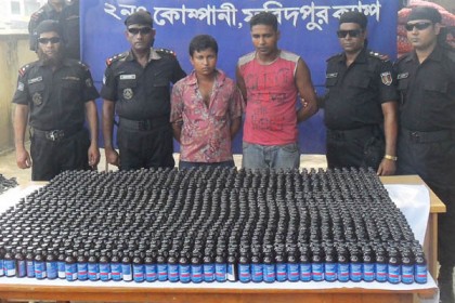 ফরিদপুরে ১২শ বোতল ফেনসিডিলসহ আটক ২