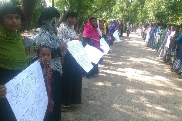 যুবলীগ নেতা খুনিদের গ্রেফতারের দাবিতে মানববন্ধন 
