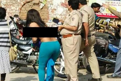 নোট বিড়ম্বনায় পোশাক খুলে তরুণীর প্রতিবাদ