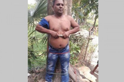 মাদারীপুরে গাছের সাথে সাংবাদিককে বেঁধে নির্যাতন
