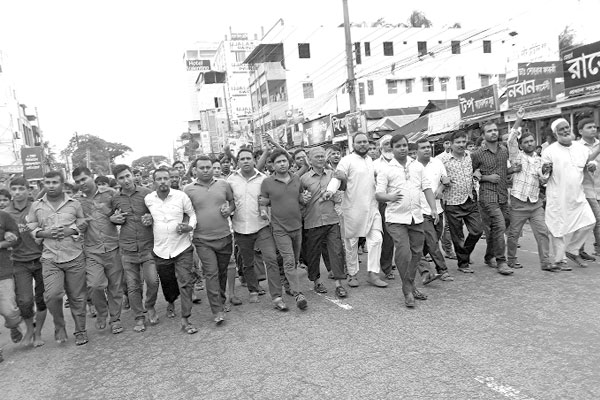 এমপি একরামকে হত্যার হুমকির প্রতিবাদে সমাবেশ হুমকিদাতা আটক
