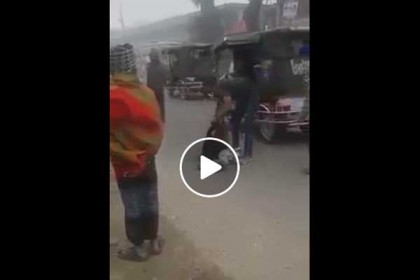 বৃদ্ধাকে পুলিশ সদস্যের জ্যাকেট পরানোর ভিডিও ভাইরাল!