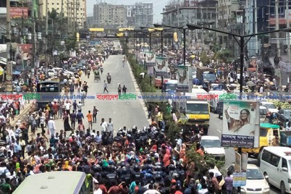 বকেয়া বেতনের দাবিতে সাভারে মহাসড়ক অবরোধ