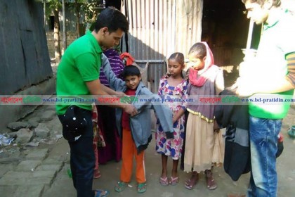 নেত্রকোনায় শিশুদের মাঝে শীতবস্ত্র বিতরণ