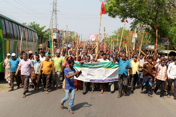 রাজশাহী পাটকল শ্রমিকদের লাঠি মিছিল