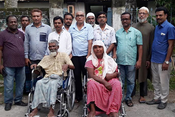 কিশোরগঞ্জে দুই প্রতিবন্ধী পেল হুইল চেয়ার

