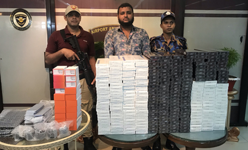 শাহজালালে ২৭৪ কার্টন আমদানী নিষিদ্ধ সিগারেট ও ৯৬ পিস মোবাইলসহ আটক ১