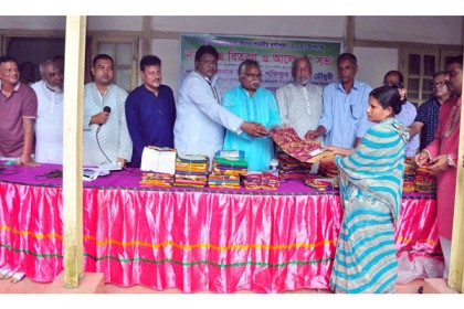 শারদীয় দুর্গোৎসবে বিশ্বনাথে বস্ত্র বিতরণ