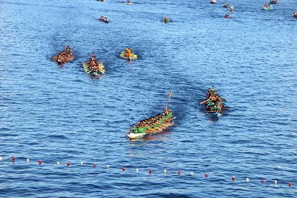 রাঙামাটিতে উৎসবমুখর পরিবেশে শেখ রাসেল স্মৃতি নৌকা বাইচ