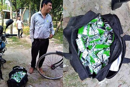 টিফিনের বিস্কুট নিয়ে পালানোর সময় হাতেনাতে ধরা পড়লেন প্রধান শিক্ষক