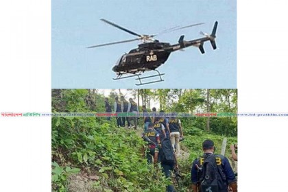 দুর্গম পাহাড়ে হেলিকপ্টারে রোহিঙ্গা ডাকাতের আস্তানা সন্ধানে র‌্যাব