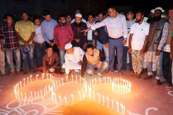 নেত্রকোনায় ১০০ মোম জ্বালিয়ে শিশু দিবসের সূচনা