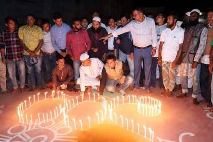 নেত্রকোনায় ১০০ মোম জ্বালিয়ে শিশু দিবসের সূচনা