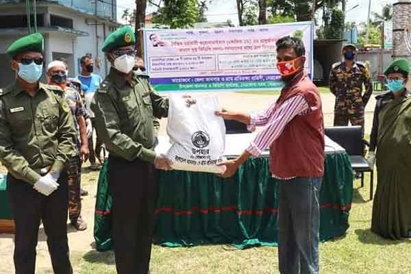 নেত্রকোনায় আনসার ভিডিপি সদস্যদের মাঝে ত্রাণ সহায়তা