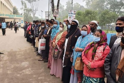 শরীয়তপুরে জাতীয়করণকৃত প্রাথমিক শিক্ষক মহাজোটের মানববন্ধন