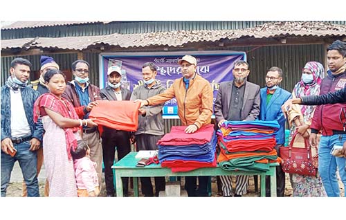 শেরপুরে আদিবাসী কোচ সম্প্রদায়ের মাঝে শীতবস্ত্র বিতরণ