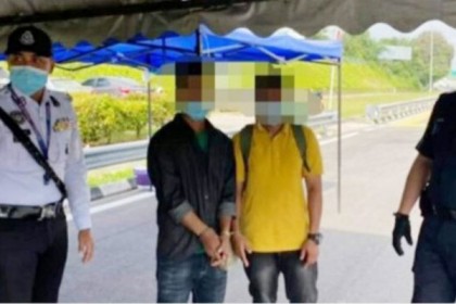 মালয়েশিয়ায় পুলিশকে ঘুষ দেওয়ার চেষ্টা, দুই বাংলাদেশি গ্রেফতার

