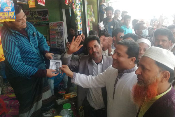 নগরকান্দা পৌর নির্বাচনে বিএনপির প্রার্থীর গণসংযোগ