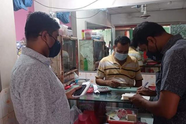 সিংড়ায় ৯ দোকানিকে জরিমানা