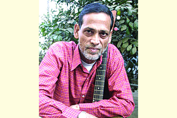গানে গানে তাঁকে স্মরণ