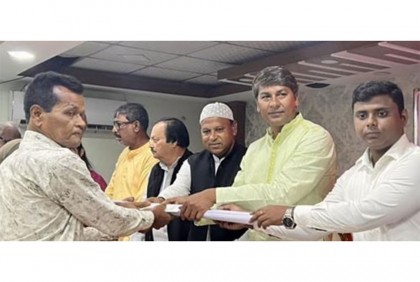 নাটোরে দুর্গাপূজা উপলক্ষে চালের ডিও বিতরণ
