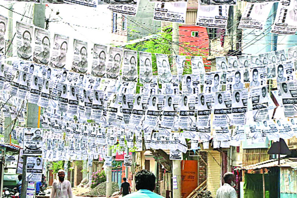 নগরজুড়ে শুধুই নৌকার পোস্টার