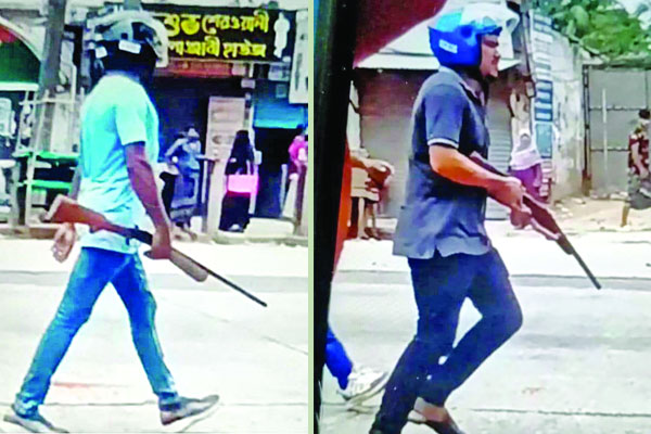 হাতে অস্ত্র মাথায় হেলমেট
