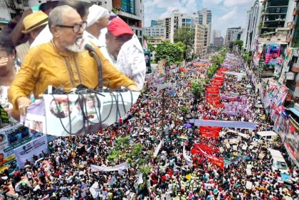 বৃষ্টিতে ভিজেই সমাবেশে বক্তব্য দিলেন বিএনপি নেতা নজরুল ইসলাম

