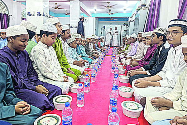 মাদরাসার শিক্ষক-শিক্ষার্থীদের চোখেমুখে তৃপ্তির হাসি