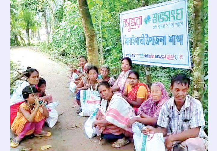 শেরপুরে বন্যার্ত ক্ষুদ্র নৃগোষ্ঠীদের খাদ্য সহায়তা