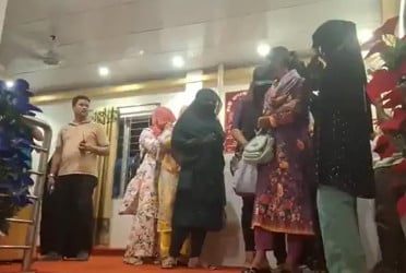 উত্তরায় হোটেলে অভিযান চালিয়ে বেশ কয়েকজনকে আটক