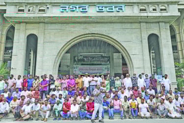 স্লোগানে উত্তাল নগর ভবন