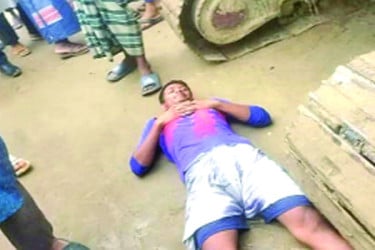 মাটিতে শুয়ে শতবর্ষী খেলার মাঠ রক্ষার চেষ্টা