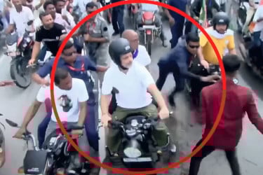 রাহুল গান্ধীর গালে আকস্মিক চুম্বন, সমর্থকদের হাতে চড় খেলেন যুবক