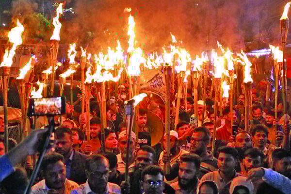 মানবিক করিডর প্রতিবাদে মশালমিছিল