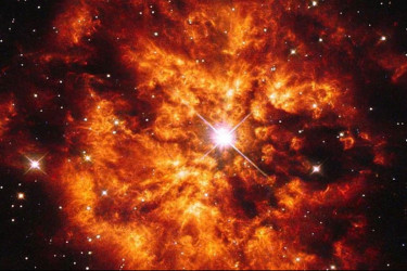 মহাকাশে আগুনঝরা তারকা ঘিরে রঙিন মেঘ