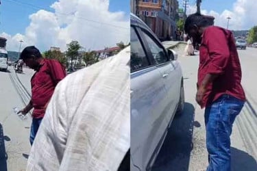 রাস্তায় পানের পিক ফেলায় ভারতীয় পর্যটককে দিয়ে পরিষ্কার করালেন নেপালি নাগরিক