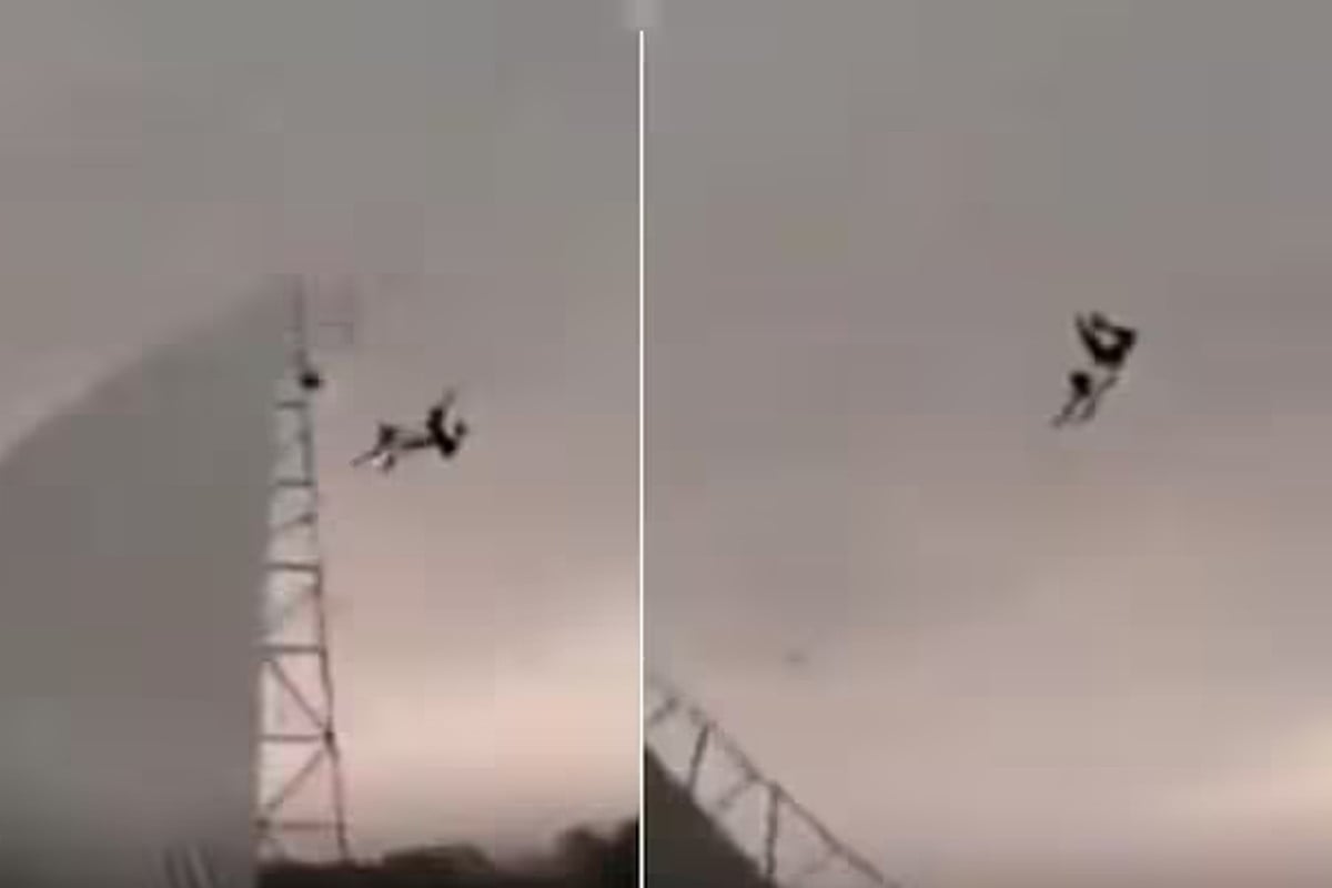 ঝড়ের কবলে টিনের চালসহ উড়ে গেলেন যুবক!