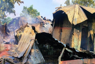 নওগাঁয় হত্যার ঘটনায় আসামিদের বাড়িতে হামলা
